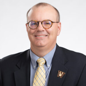 Brett Geier in suit and tie